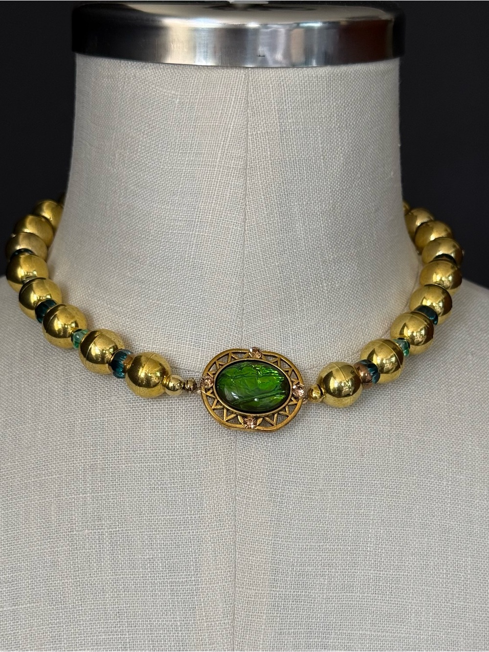Gold Beaded Necklace with Green Glass Centerpiece
